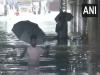 सूरत में भारी बारिश के कारण कई इलाकों में पानी भरा 