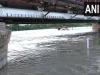 दिल्ली में खतरे के निशान से ऊपर बह रही यमुना नदी 